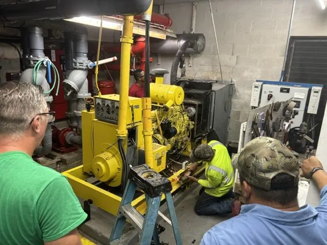 Wavelength Electrical Contracting technicians servicing a commercial standby generator