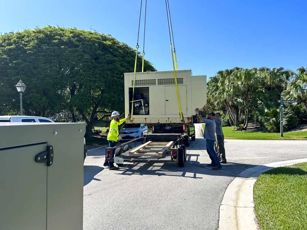 Commercial standby generator delivered by crane for a Merritt Island backup power project