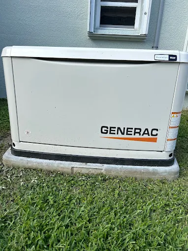 Generac standby generator installed on a concrete pad in Melbourne, FL