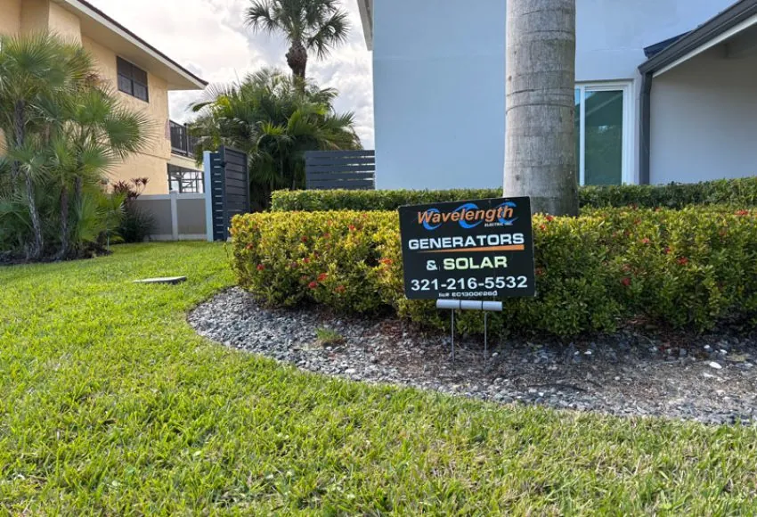 Wavelength Generators & Solar yard sign on a Melbourne, FL lawn