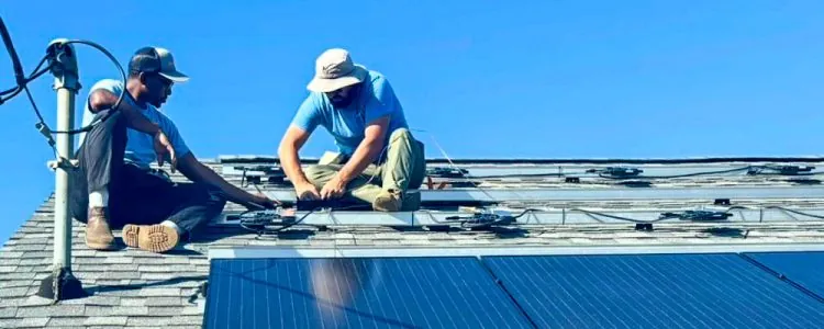 Wavelength technicians installing rooftop solar panels in Brevard County, FL